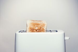 A toaster, which places a large demand on an electrical circuit