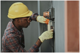 A man working on electrical circuits